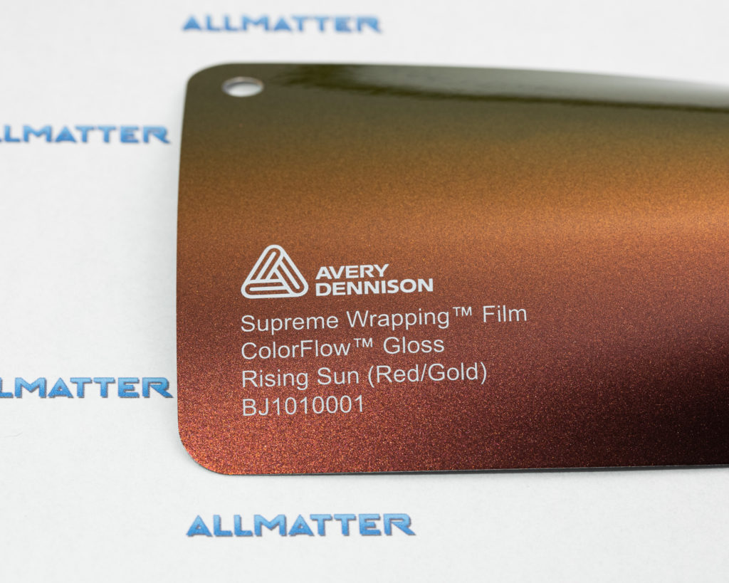 Próbka folii o nazwie Rising Sun w kolorze czerwonym i złotym