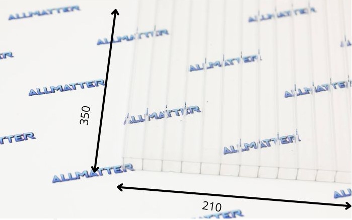 Przezroczysty materiał z wymiarami 350x210 mm na tle logo Allmatter