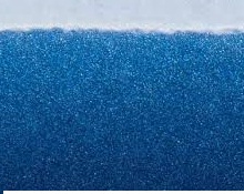 Metaliczny ciemnoniebieski materiał z drobinkami błyszczącymi