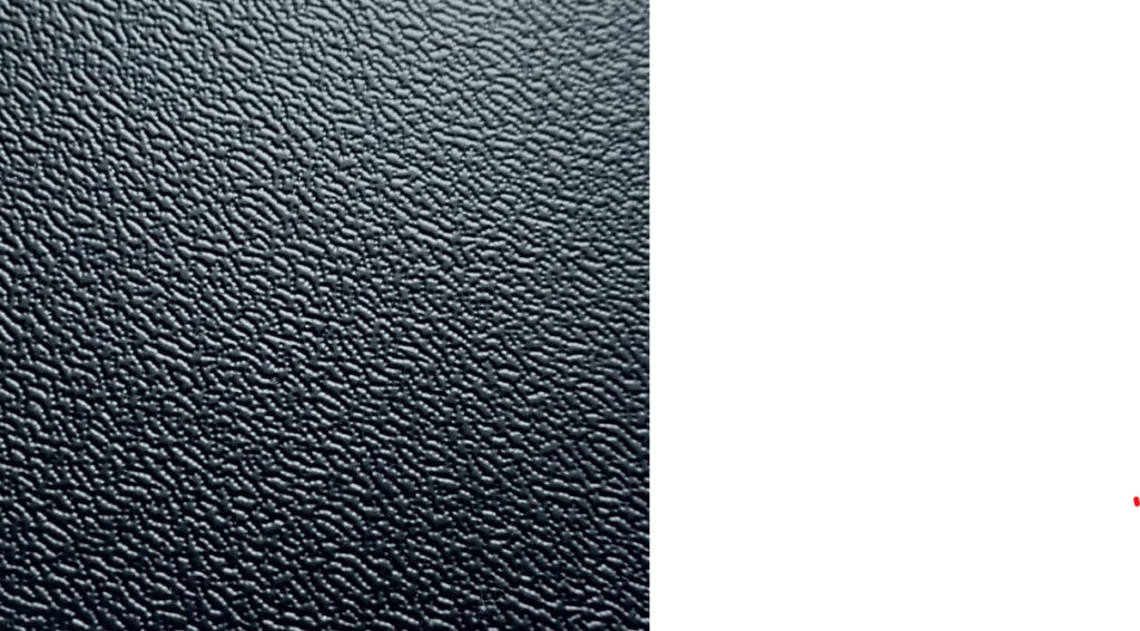 Czarna, teksturowana powierzchnia z delikatnym wzorem embossa